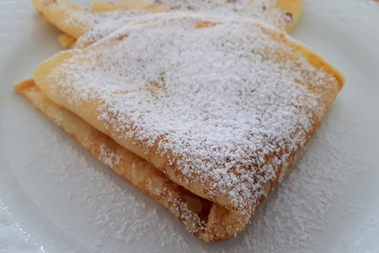 Crespelle di ricotta al ragù